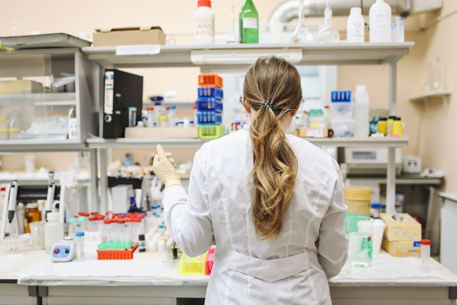 Female scientist working in a laboratory, chemical analysis