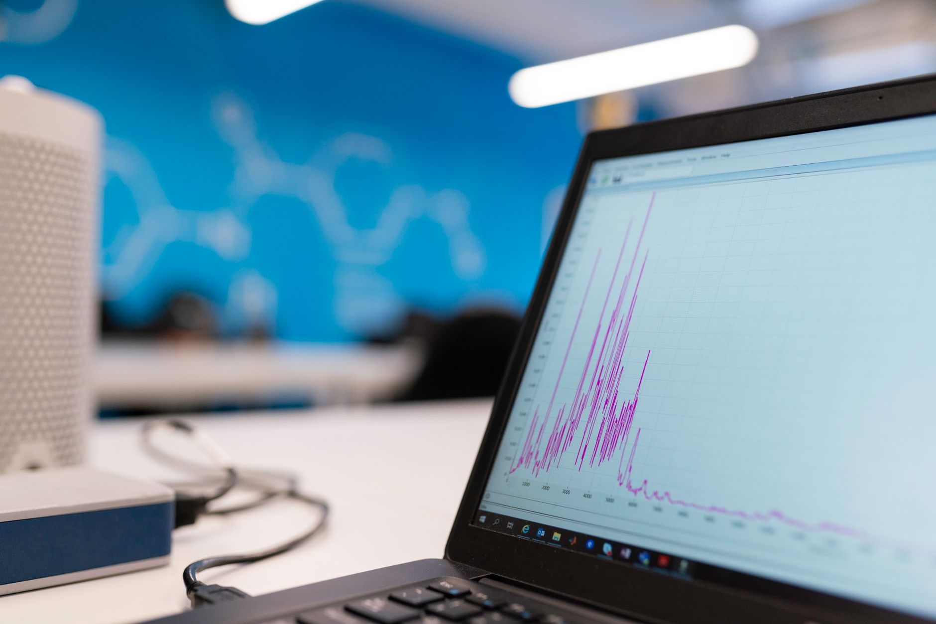 Laptop displaying a data analytics graph