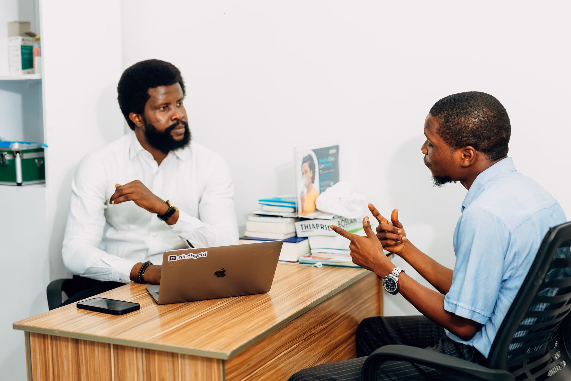 Two professionals in a consultation meeting